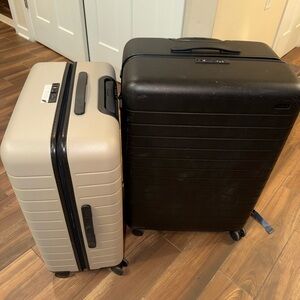 Away black and tan luggage
